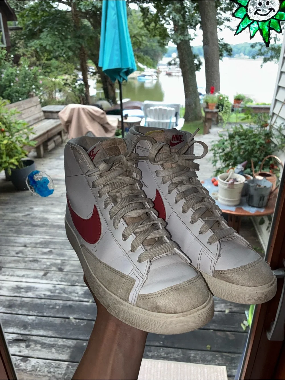 Nike Women's White High-Top Sneakers with Red Swoosh